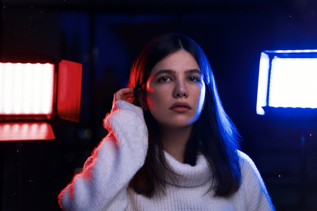 Studio portrait of a young female video editor